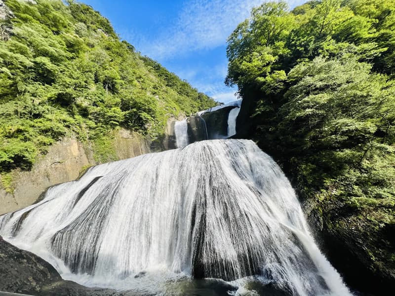 Fukuroda Falls in ibaraki, Japan - One of Japan's three most beautiful waterfalls, cascading 120 meters in four distinct tiers through a forested gorge, with observation decks offering dramatic seasonal views.