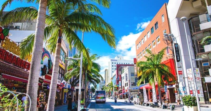 Kokusai Dori Street in okinawa, Japan - Naha's vibrant main street stretching 1.6 kilometers, lined with shops selling Okinawan souvenirs, local foods, island crafts, and entertainment venues, embodying the energy and culture of modern Okinawa