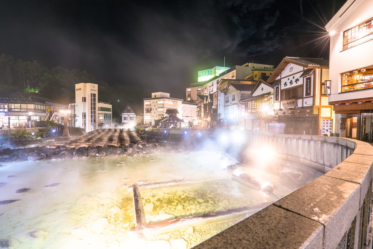 Kusatsu Onsen in gunma, Japan - Japan's most famous hot spring resort, renowned for its highly acidic healing waters, traditional yumomi performances, and charming mountain town atmosphere at 1,200 meters elevation.