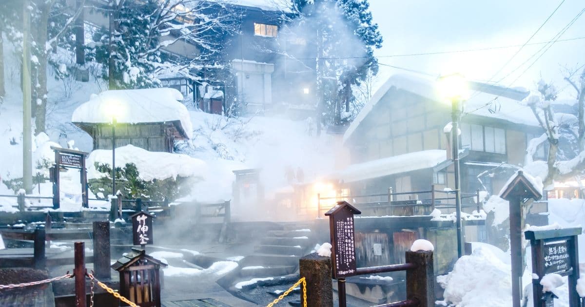 Nozawa Onsen in nagano, Japan - A charming traditional onsen village famous for world-class powder skiing in winter, 13 free public bathhouses, and authentic mountain town atmosphere.