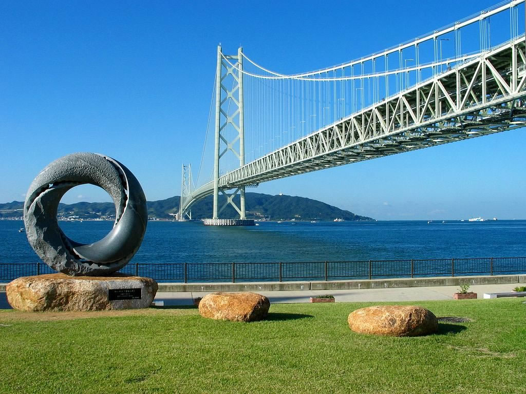 Akashi Kaikyo Bridge & Maiko Park in hyogo, Japan - World's longest suspension bridge spanning 3,911 meters with walking bridge interior tours, observation facilities, and waterfront park views.