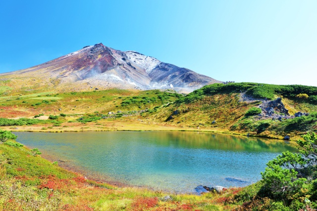 Daisetsuzan National Park in hokkaido, Japan - Japan's largest national park, featuring dramatic alpine peaks, pristine wilderness, volcanic landscapes, and some of the country's earliest autumn colors.