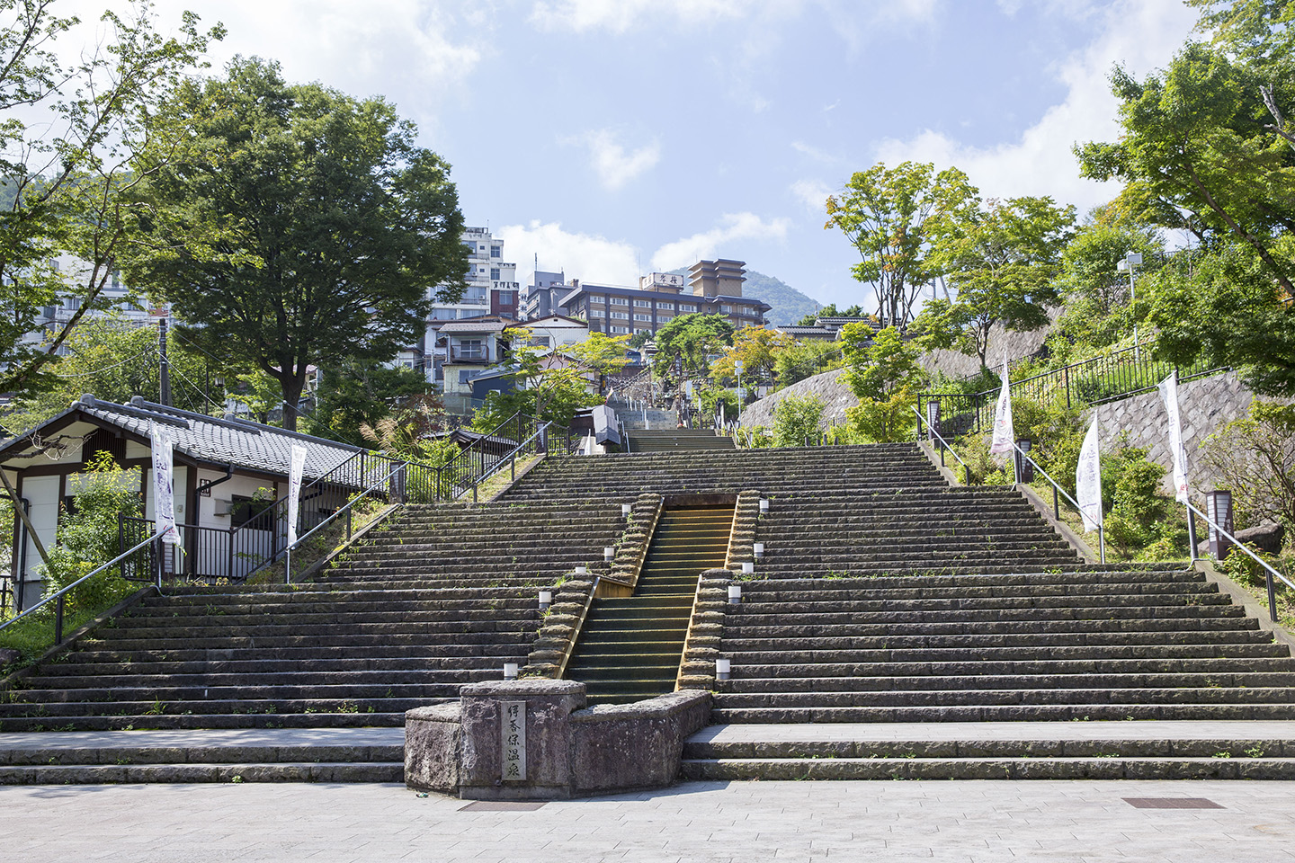 Ikaho Onsen in gunma, Japan - A historic hot spring town built on a mountainside, famous for its iconic 365-step stone staircase lined with traditional ryokan, shops, and two types of therapeutic spring water.