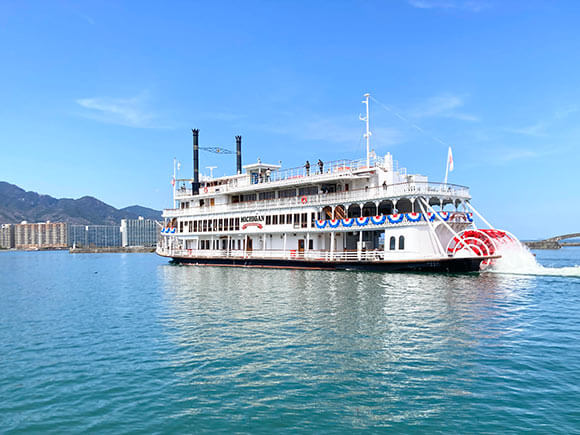 Lake Biwa Cruise Hikone in shiga, Japan - Scenic boat cruises on Japan's largest freshwater lake departing from historic Hikone, offering views of Hikone Castle, islands, mountains, and the vast 670-square-kilometer Lake Biwa.