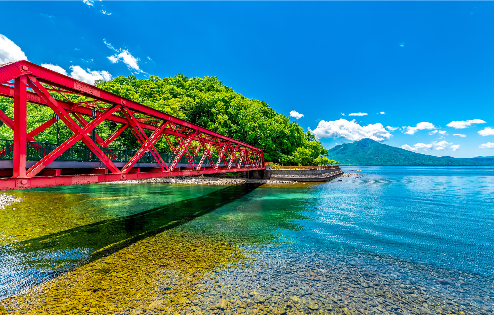 Lake Shikotsu in hokkaido, Japan - Japan's second-deepest and northernmost ice-free lake, renowned for exceptional water clarity, pristine natural surroundings, and seasonal beauty.