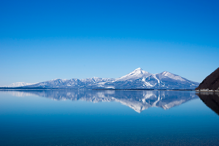 Mount Bandai & Urabandai in fukushima, Japan - Volcanic mountain and its spectacular northern plateau dotted with colorful lakes, autumn foliage, and hiking trails shaped by a massive 1888 eruption.
