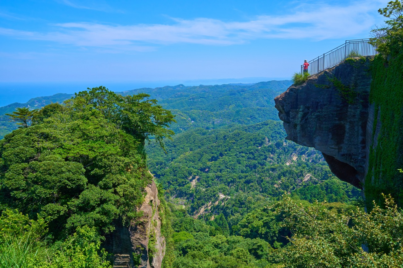 Mount Nokogiri & Nihon-ji in chiba, Japan - A dramatic mountain featuring Japan's largest stone Buddha, temple ruins carved into cliffs, a thrilling observation deck nicknamed 'Hell Peek,' and ropeway access with Tokyo Bay views.