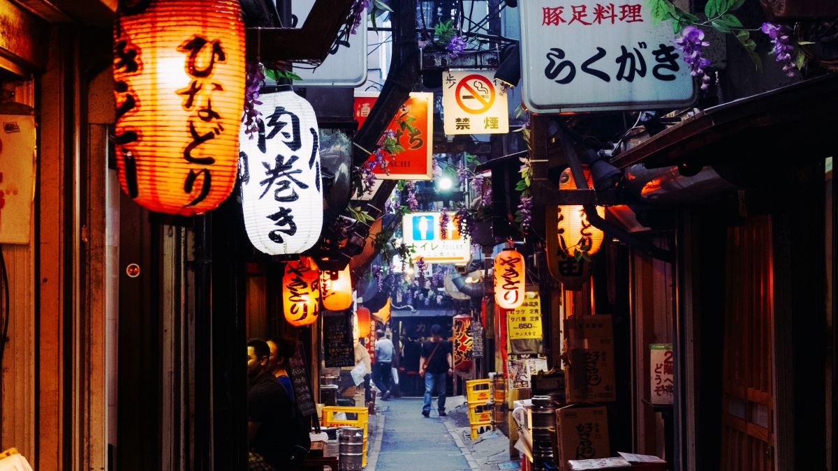 Omoide Yokocho in tokyo, Japan - A narrow maze of tiny yakitori alleys near Shinjuku Station, preserving Tokyo's post-war drinking culture with smoky grilled skewers and nostalgic atmosphere.