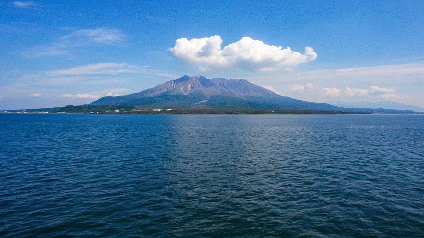 Sakurajima Volcano in kagoshima, Japan - One of Japan's most active volcanoes, dramatically situated in Kagoshima Bay. The iconic peak regularly emits ash and steam, creating spectacular views and offering visitors a rare chance to observe volcanic activity up close.
