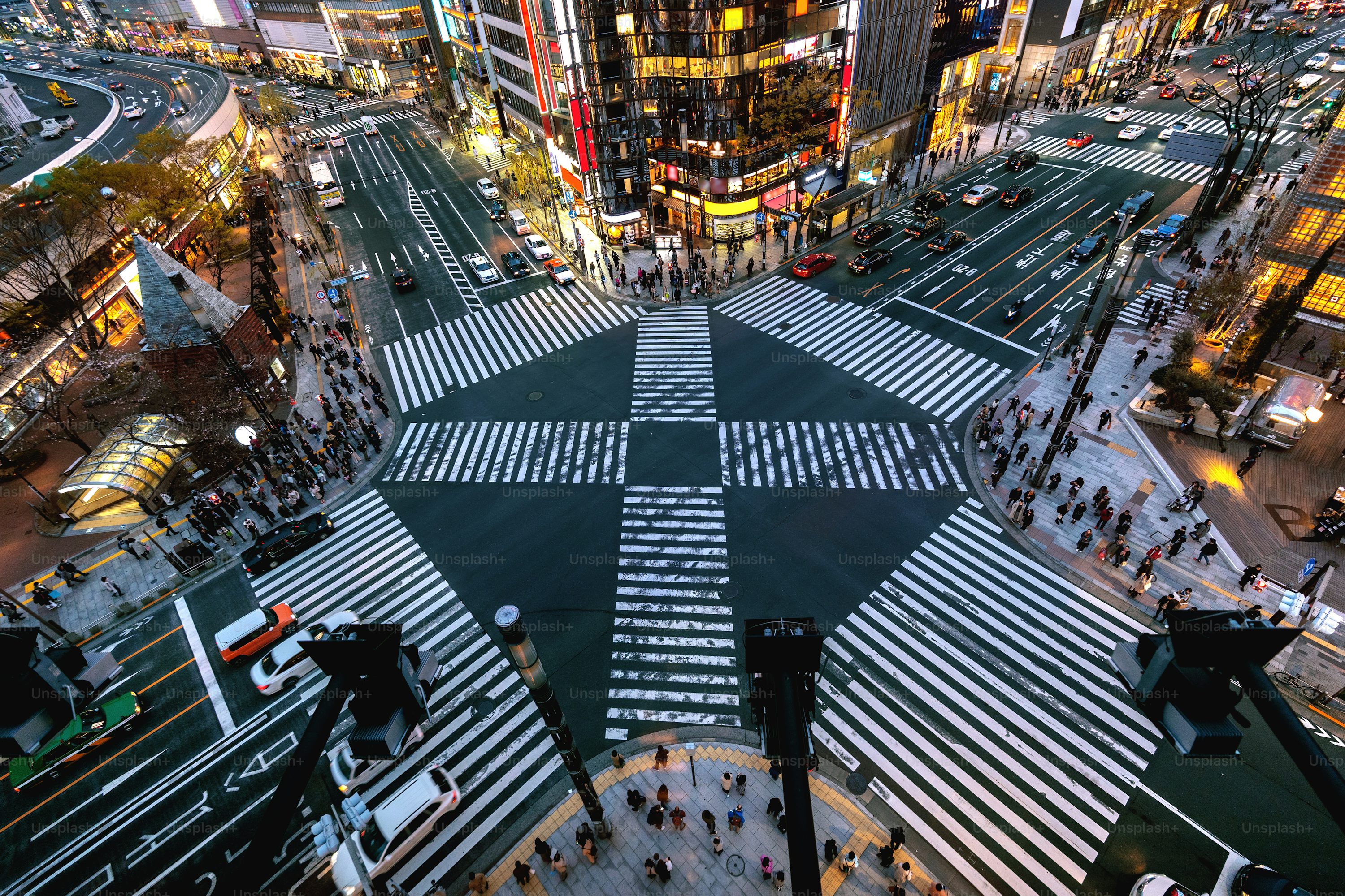 Shibuya Crossing in tokyo, Japan - The world's busiest pedestrian crossing where up to 3,000 people cross simultaneously, creating an iconic symbol of Tokyo's urban energy and organized chaos.