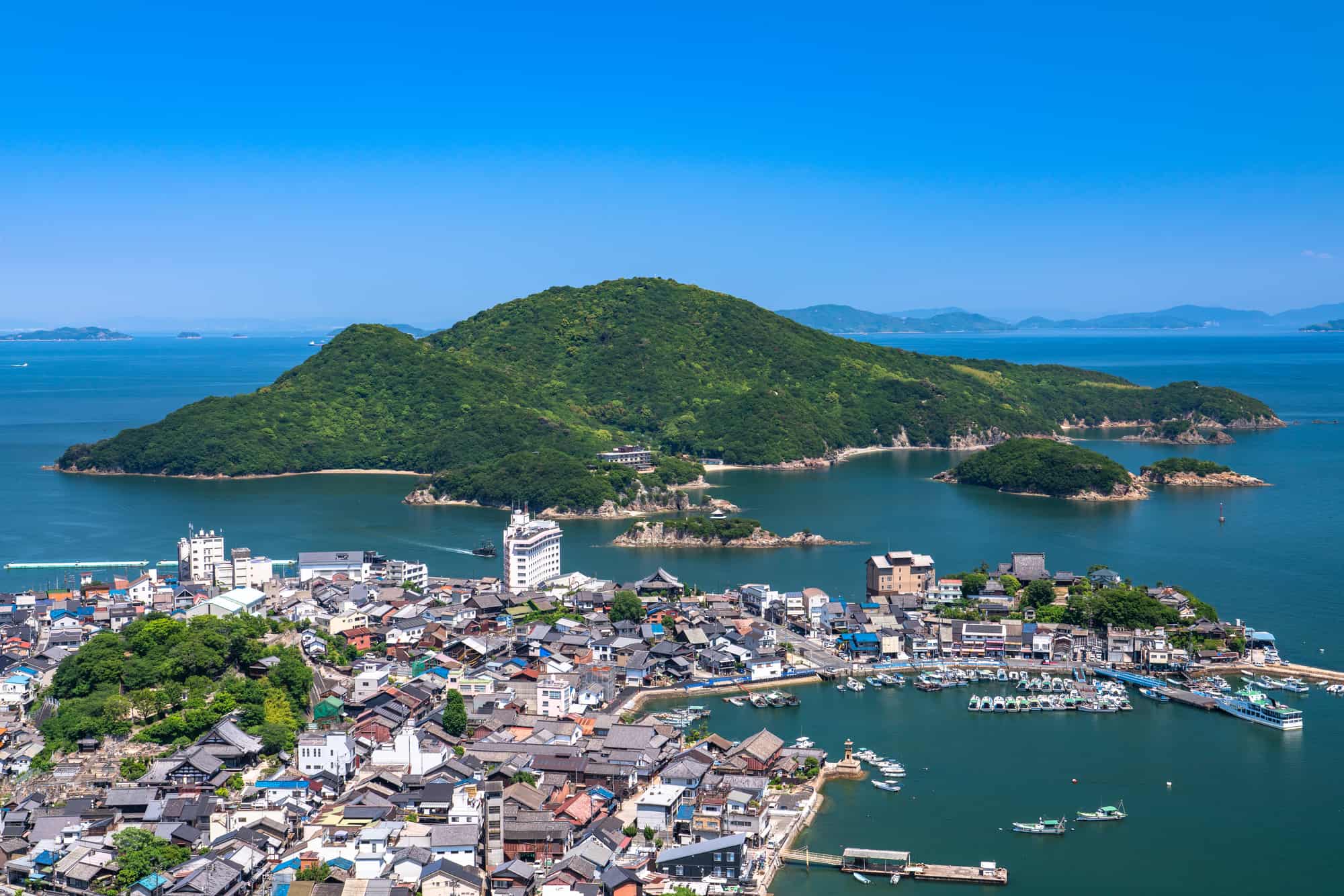 Tomonoura in hiroshima, Japan - A picturesque historic port town on the Seto Inland Sea, featuring traditional architecture, scenic harbor views, and the inspiration for Studio Ghibli's 'Ponyo on the Cliff.'