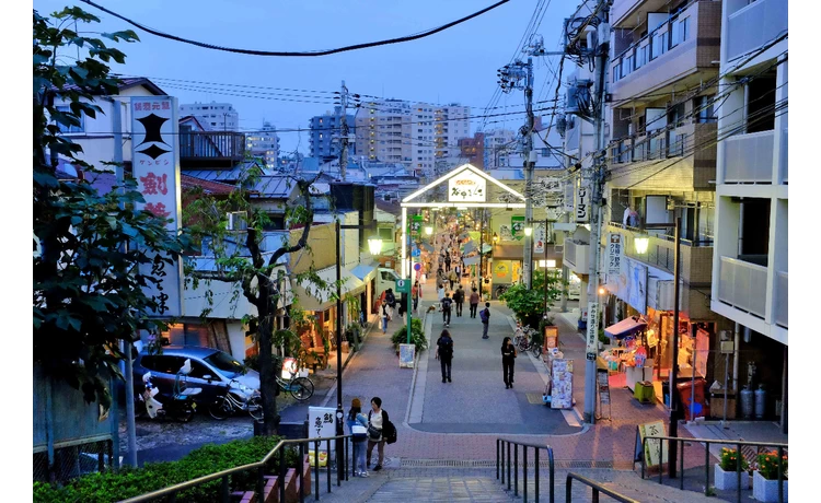 Yanaka Ginza Old Town in tokyo, Japan - A nostalgic shopping street preserving Tokyo's Showa-era atmosphere with traditional shops, cat-themed culture, and the famous sunset steps.